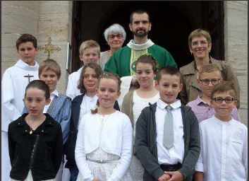 Revue de presse : Première communion en l'église Saint-Martin